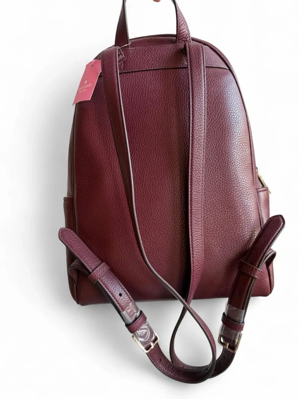 kate spade Pebbled Leather Backpack in Burgundy